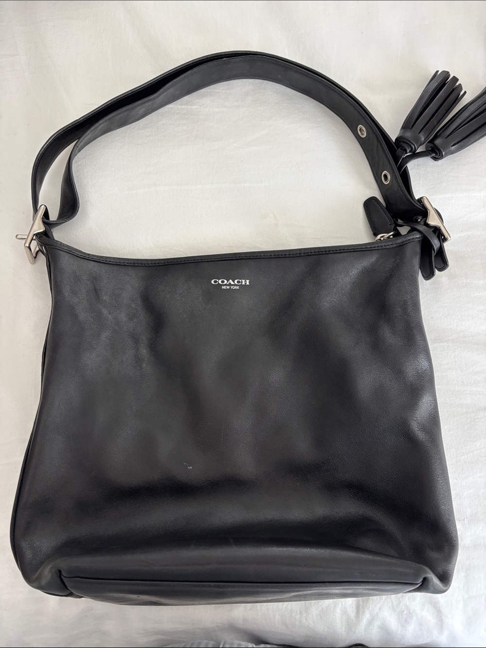 COACH Black Leather Shoulder Bag with Tassel Accent